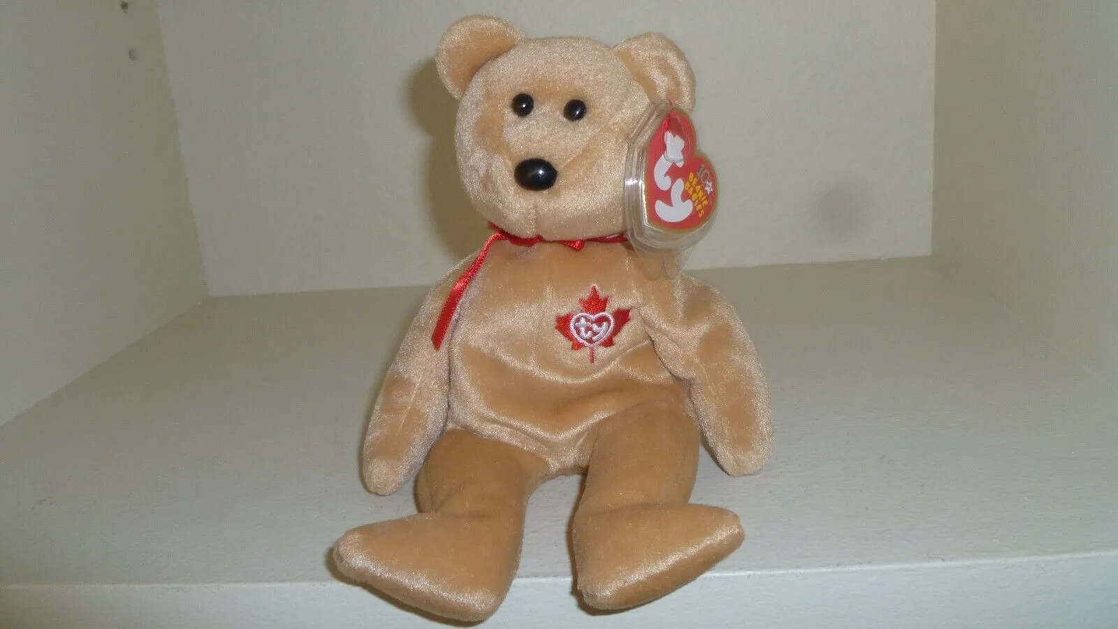 TY - BEANIE BABIES - TRUE - CANADA - BROWN BEAR TY NAME IN OAKLEAF